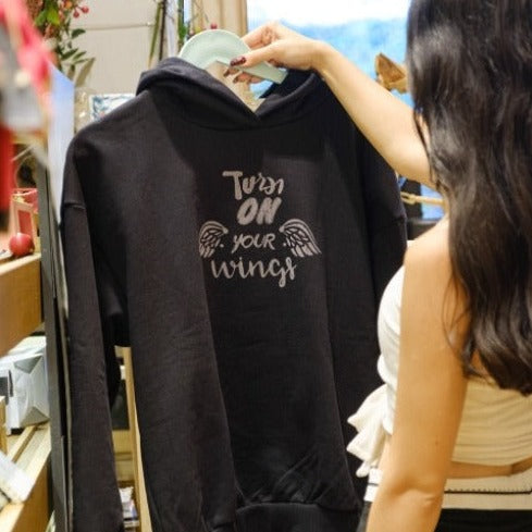 
                  
                    Turn on Your Wings Sweatshirt
                  
                